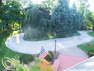 Drive-around reinforced concrete driveway