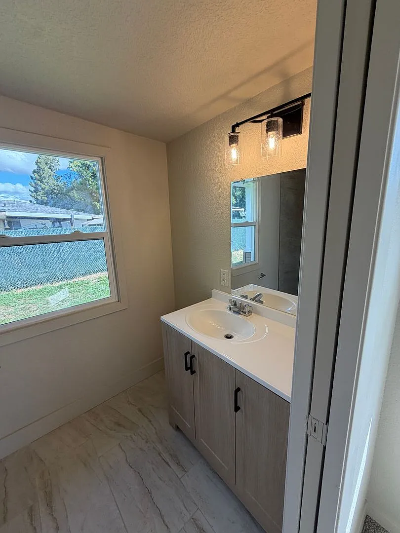 Renovated 3-Bedroom Home With Flex Space, Garage & Huge Fenced Yard — Photo 4
