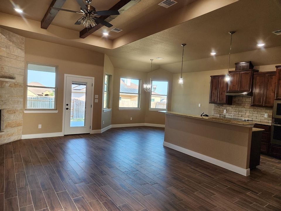 Living room, kitchen and dining area from entrance