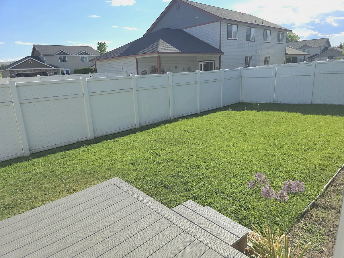Fully fenced backyard; weekly lawn care included in rent - 7004 W Mead Ave
