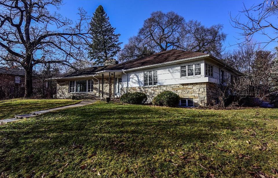 Almost a full acre lot with mature trees and close to freeways, shopping and downtown Minneapolis.