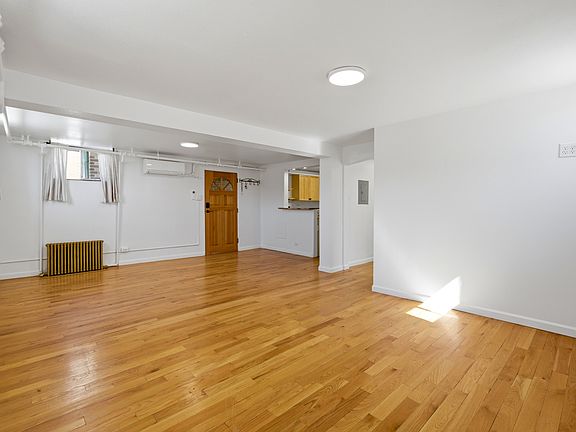 Living room with elevated wall outlets for mounted TV
