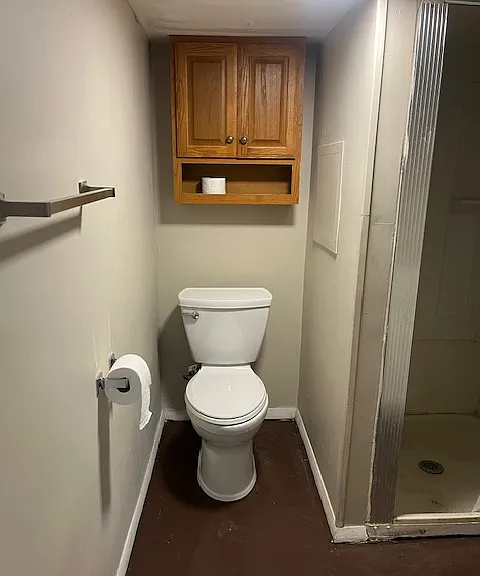 Bathroom. New toilet. 
Shower only - no tub.