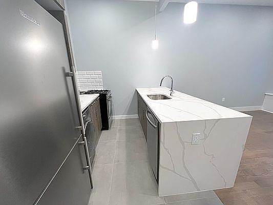 3rd image of 212 E 13th St APT 1A