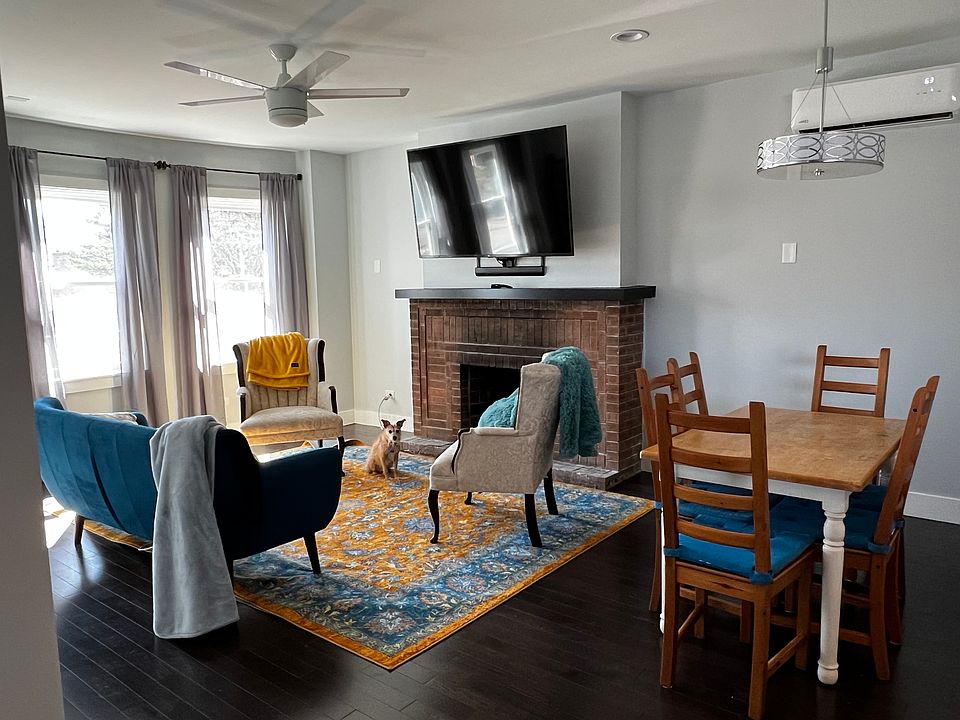 Living room and dining room, I've added another couch for extra seating and comfort since this photo was taken.