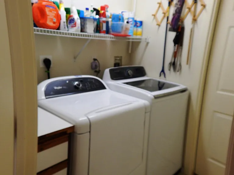Large capacity HE washer, steam-clean cycle, small-wash sink. Large capacity electric clothes dryer.