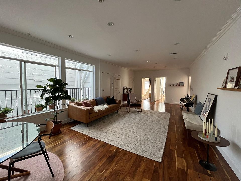 Living room, standing at front door.
