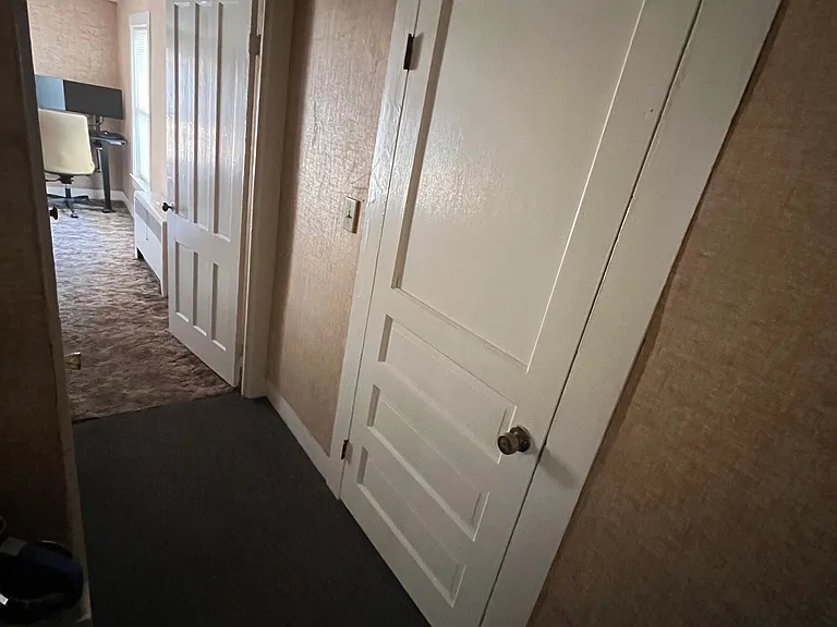 From main door: left - bedroom, straight - bathroom, right - hallway/living room & kitchen