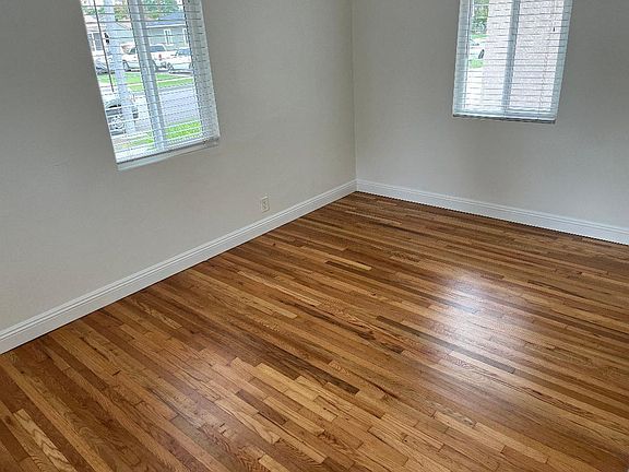 Example of all bedrooms. Windows, closets, and hardwood floors