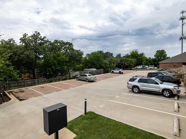 Parking lot with 4 assigned spots