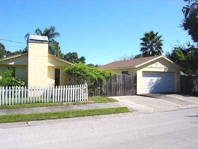Corner lot with side access to 2 car-garage