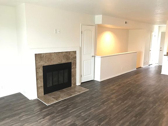 Living Room with Wood Burning Fireplace