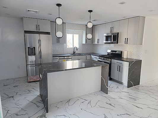 1st image of 69-33 Hillmeyer Ave #1