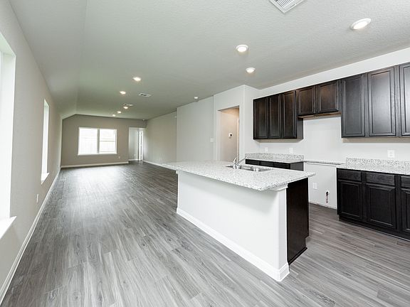 Dining Area and Kitchen to Family Room