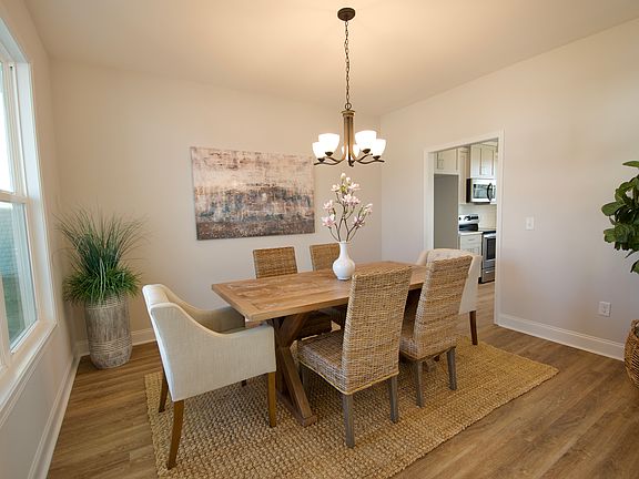 Photos represent a previous build. Selections and finishes may vary.