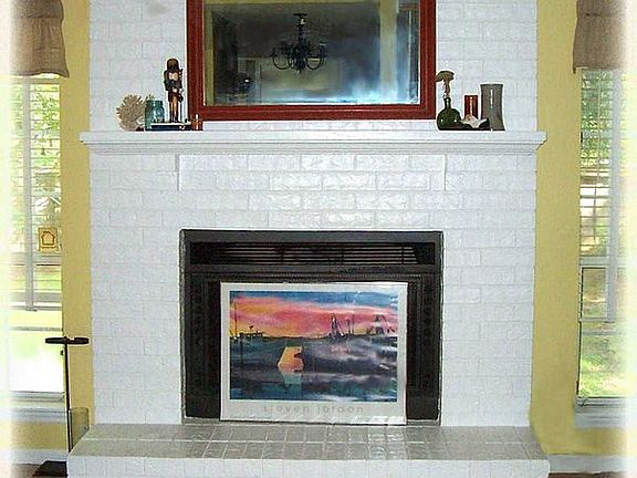 Lovely brick fireplace - cozy year-round