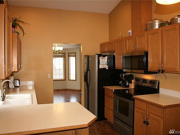 Stainless Steel Appliances Includes Fridge and New Microwave