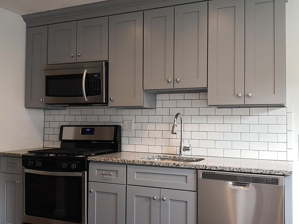 Brand new kitchen with stylish shaker cabinets