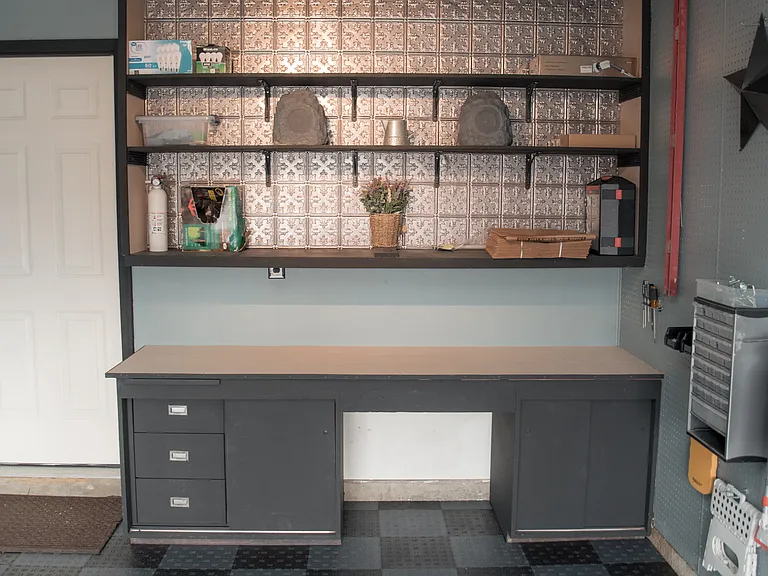Our dedicated workbench offers a sleek, high-end spot for projects, hobbies, or extra storage.