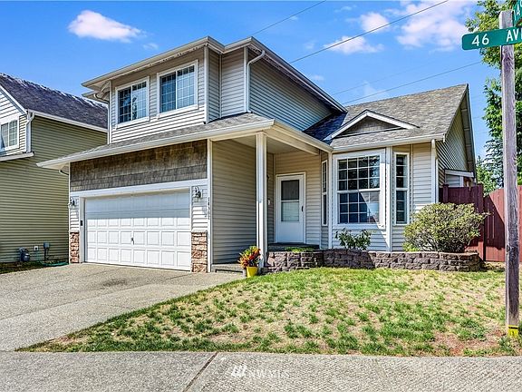 Impressive exterior condition... Nice detailing with interesting roofline, stone and shake accents.