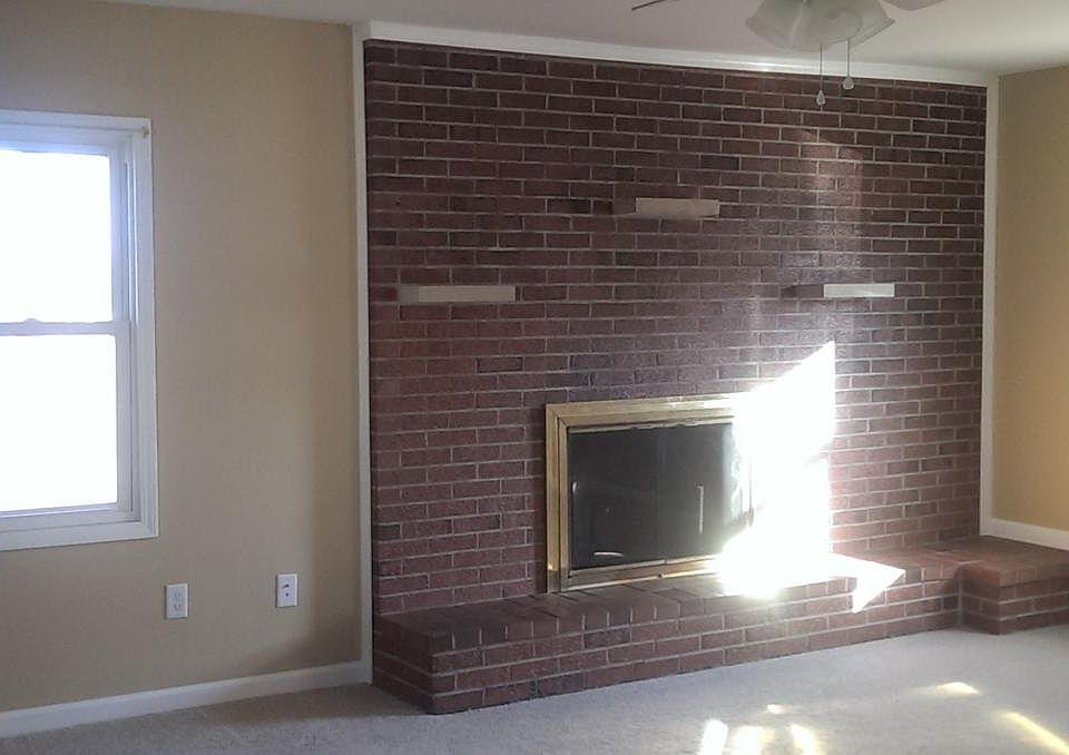 family room with wood burning fireplace