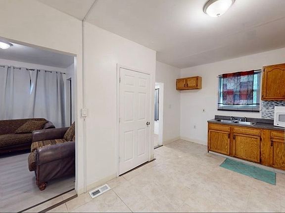 5th image of 4089 E 74th St