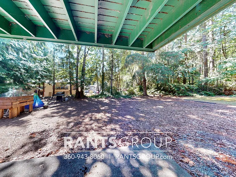 Lovely, wooded 2-bedroom apartment with a large private deck and in-unit washer & dryer! — Photo 47
