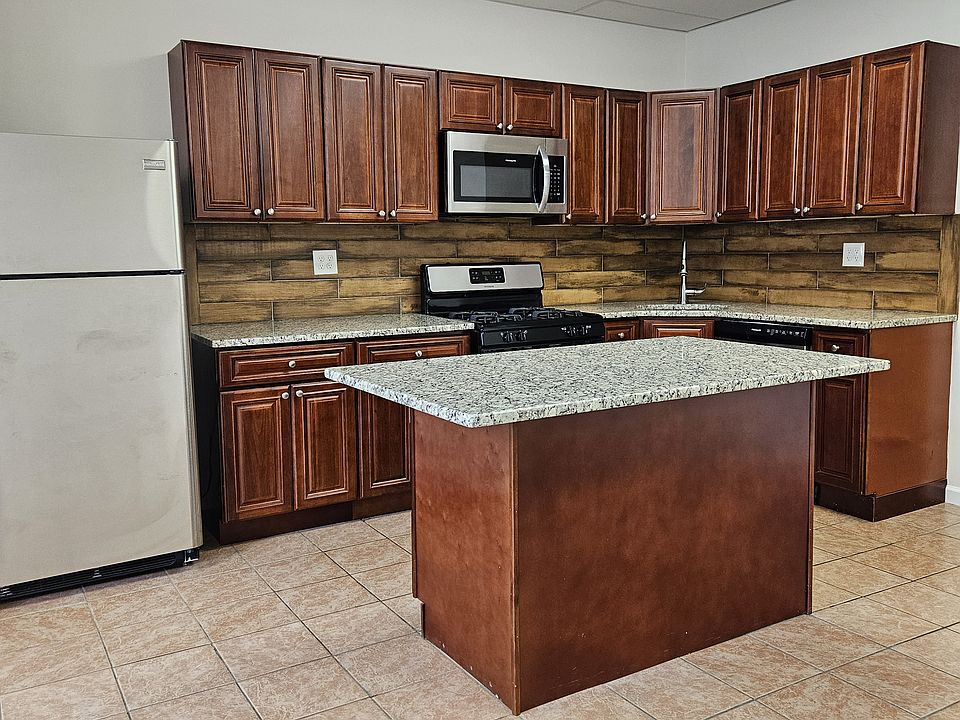 stainless steel appliances with plenty of storage.
