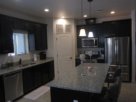 3rd image of 8678 E 34th Pl