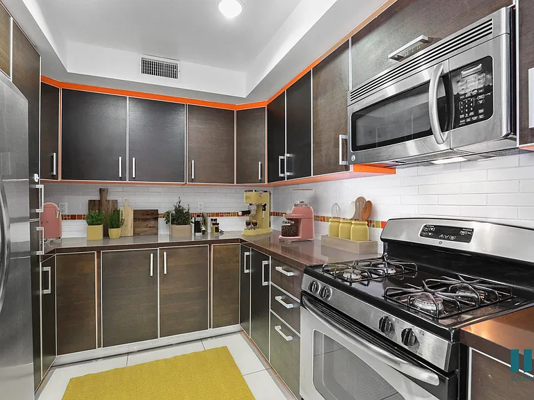 Full-Size Kitchen with Energy-Effcient Appliances and Ample Cabinet Storage