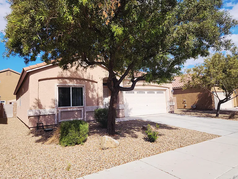 Full drive way, low maintenance front yard