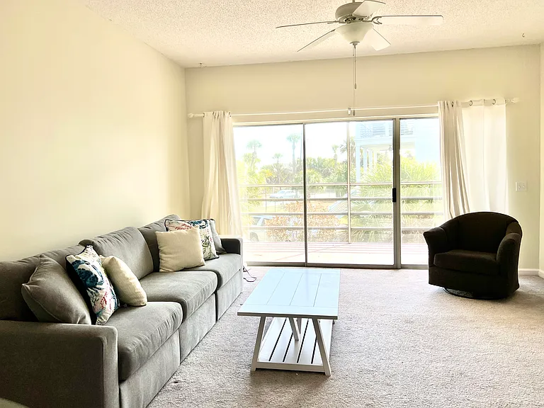 ocean view living room with large sofa