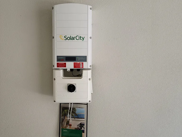 Inside view of the garage showing the system for the solar panels.