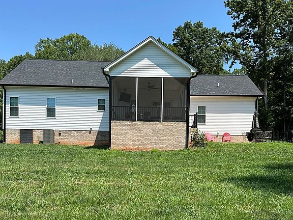 Back, screened porch, patio, fenced in yard