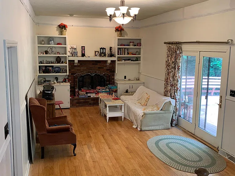 Large family room with high ceiling.