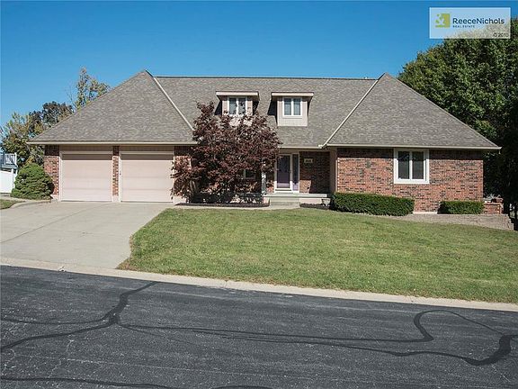 Great curb appeal - elegant home on estate sized lot with no neighbors behind.