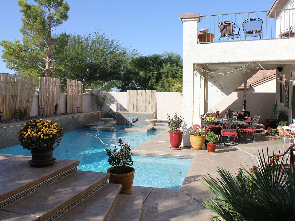 Backyard pool, spa, balcony and sundeck.