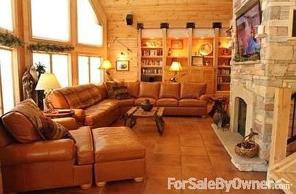 Outside front
						:
						The view toward the front of the home. The driveway circles clear around.