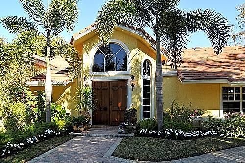 Stunning and unique home on 1.25 acres, next to a nature preserve, with pool and regulation tennis court. Home is completely & meticulously renovated.