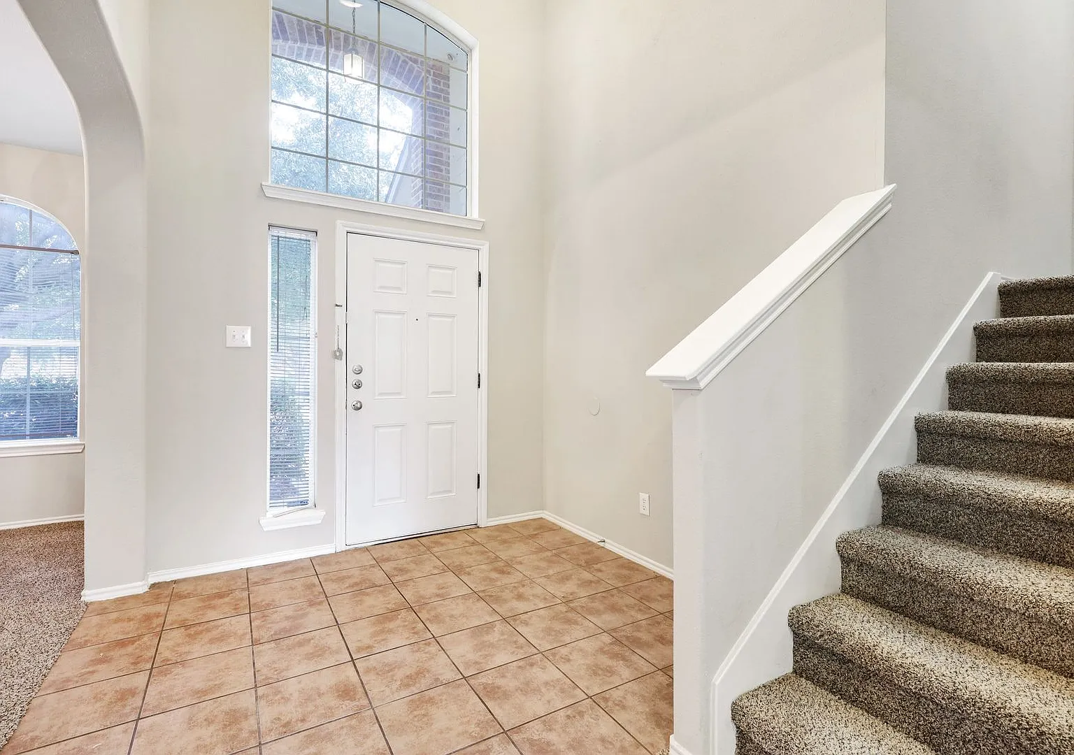 Spacious Four-Bedroom, Three-Bathroom Home with Modern Amenities and Community Perks — Photo 2
