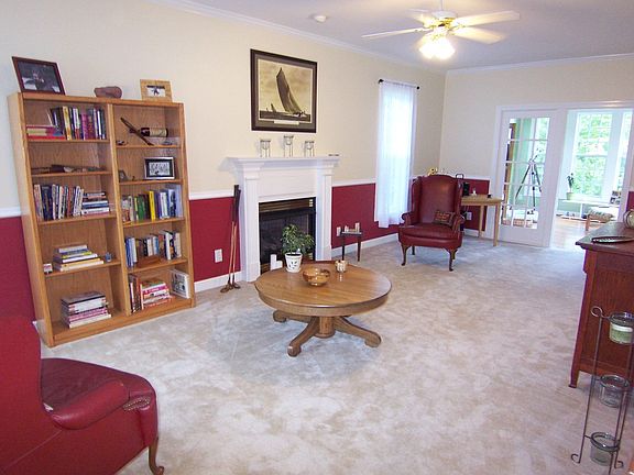 Formal living room with gas log fireplace