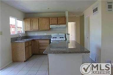 5th image of 8720 Tyrone Ave