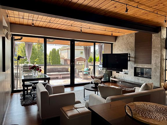 living area 1 , fire place and outdoor terrace