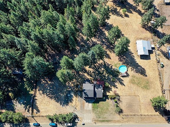 Come to the country and enjoy these 5 acres.