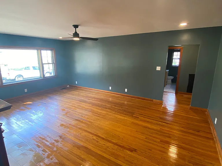 Living room view from entryway hall opening.