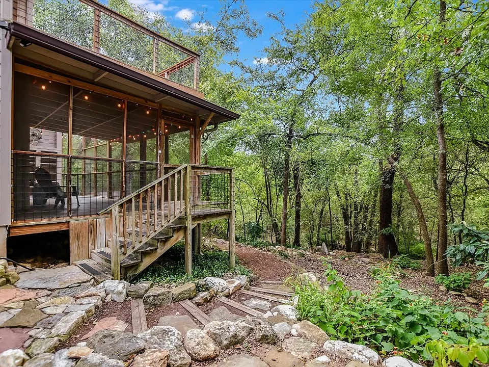 Nature lovers paradise! screened in lower porch with 1/2 high ceiling. mister fan. upper deck in the trees/stars. private entrance to the greenbelt. There will be a backyard/ fence too starting by the garage!