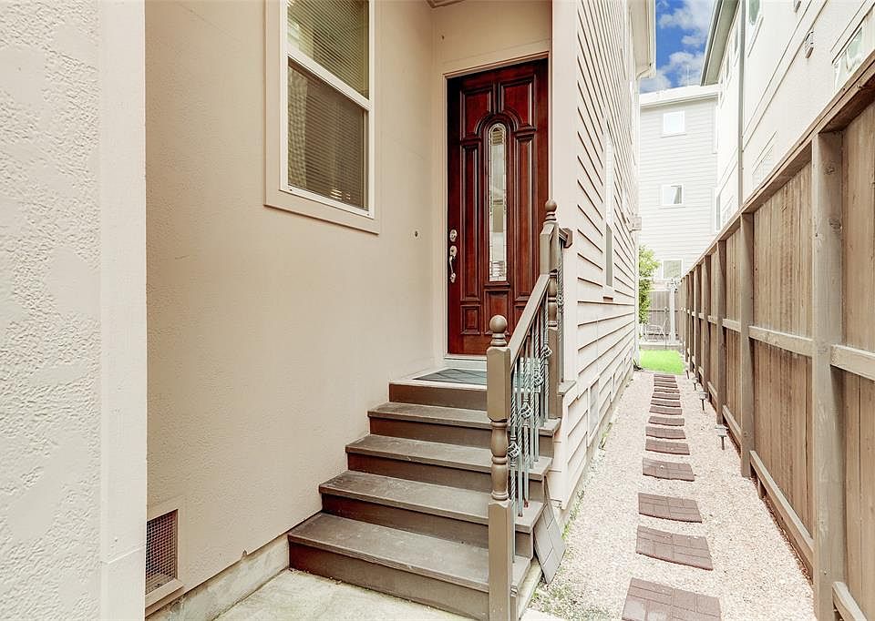 Front door is inside a private gated entrance.