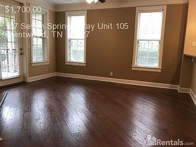 Great room with gas fireplace. Walkout to gated patio.
