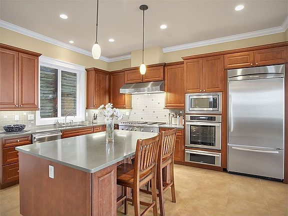 The kitchen features only the highest level finishes.