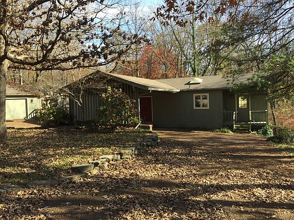 Circle drive with carport